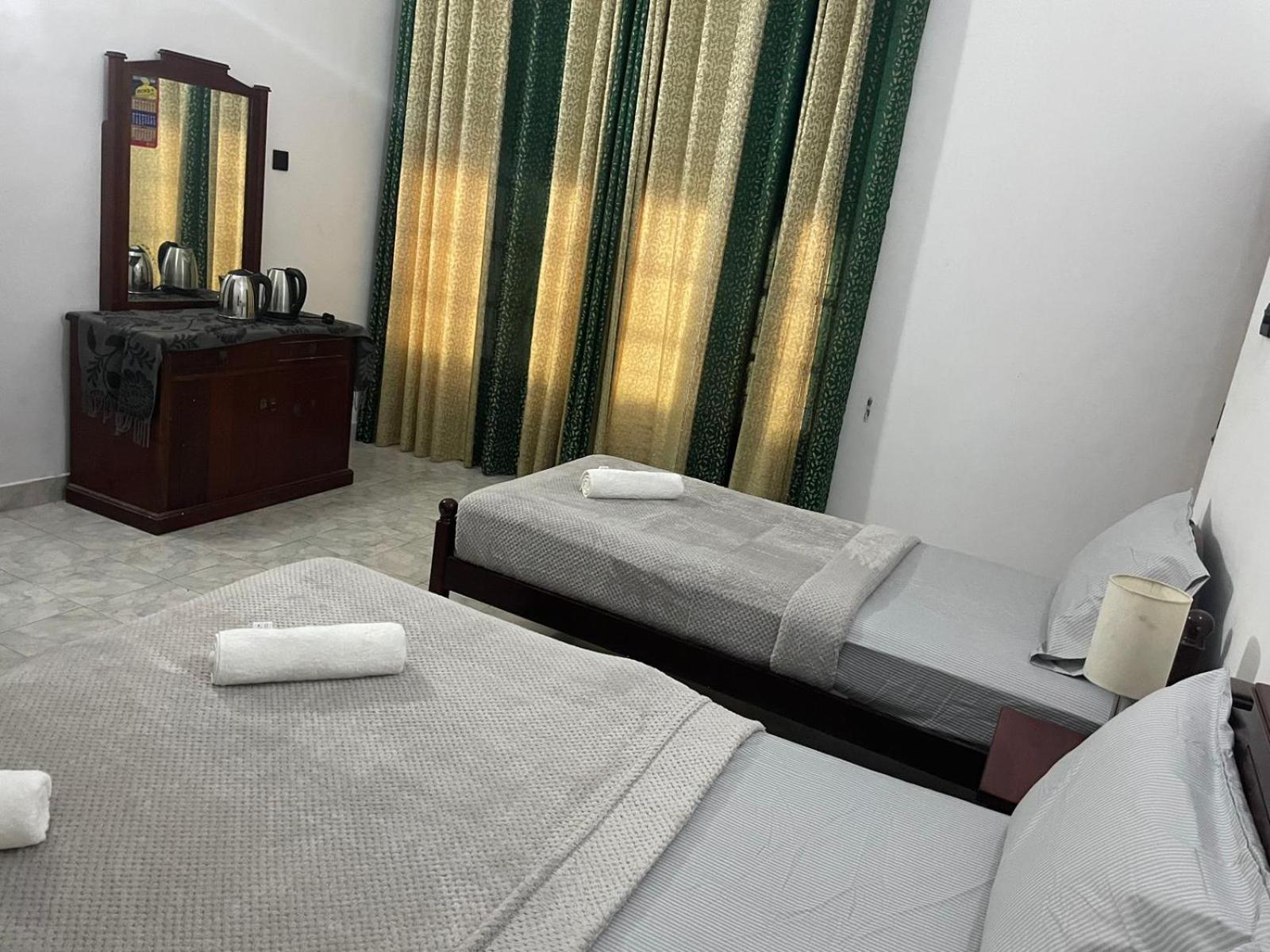 Chambre Triple avec Salle de Bains Privative